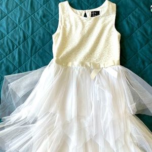 White dress that is sure to make your girl twirl!